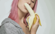 woman licking banana